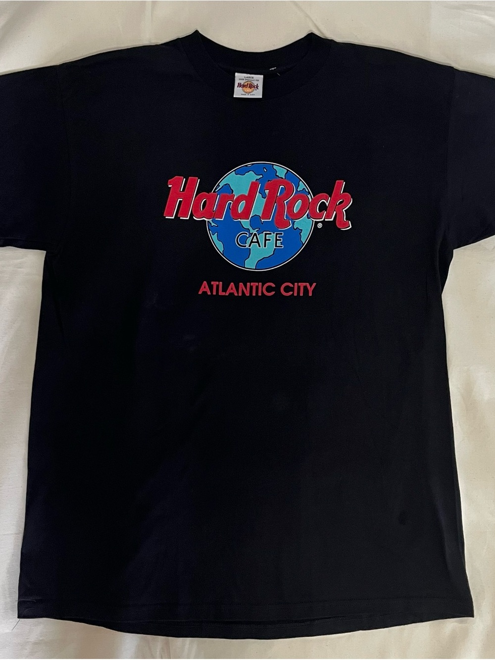 Hard Rock Cafe Black Tee with Red Logo and Blue/Teal Globe. Size Large